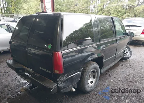 1999 Chevrolet Tahoe C1500 из США, поврежденный, VIN 1GNEC13RXXR153785